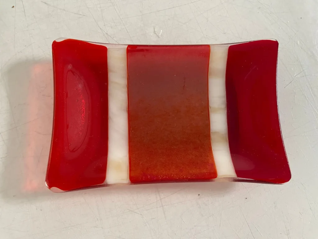 “Crimson Current” Small Dish 4″ x 6″ - Fused Glass