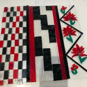 12″ x 12″ Table Decor is dancing with Red, Black and White. Highlighted by Red Flowers. - Fused Glass