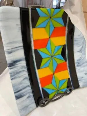 A dramatic Fused Glass Piece - can be hung on the wall, In a Stand, or laying on the table