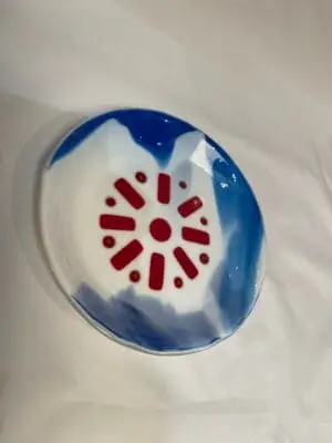 Red, White, and Blue Adorn this plate 9"