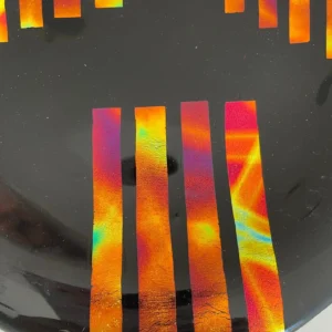 Black Glass Adorned with Colorful Dichroic Strips 9″ Round Tray - Fused Glass