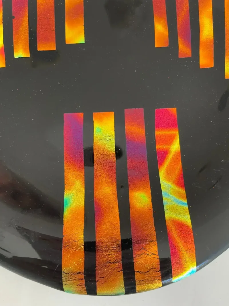 Black Glass Adorned with Colorful Dichroic Strips 9″ Round Tray - Fused Glass