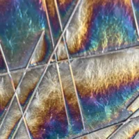Colorful Iridescent Plate with Strips of Glass 12″ x 12″ - Fused Glass