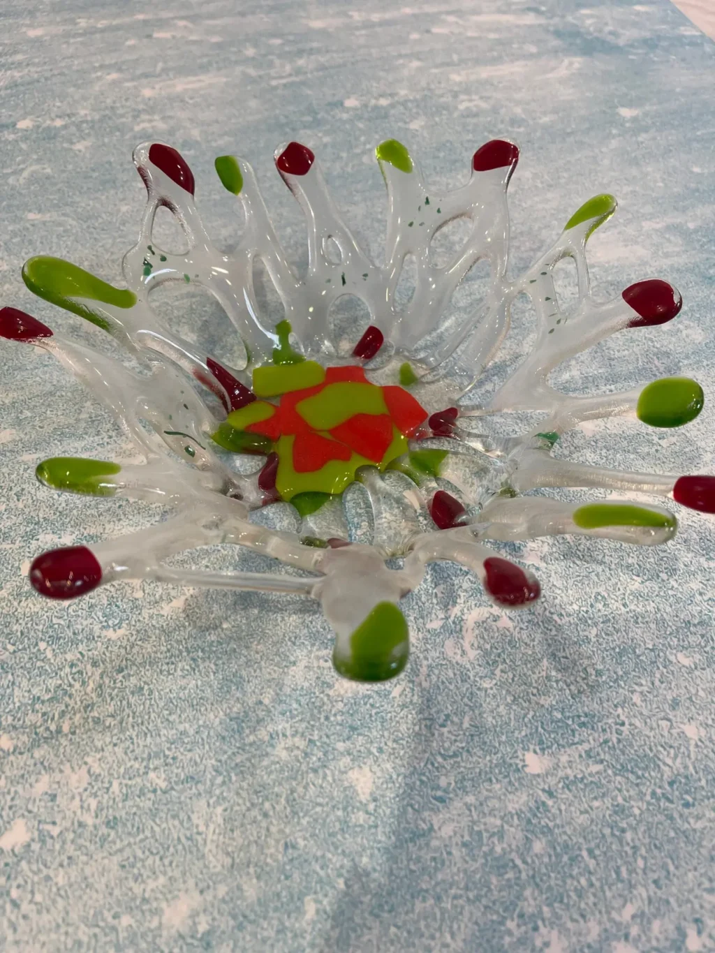 Glass bowl with holes – clear, red and green 9″ x 9″ - Fused Glass