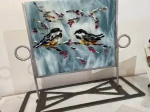 2 birds with a beautiful streaky blue and white background